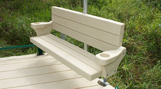 A bench with cup holders on the back of it.