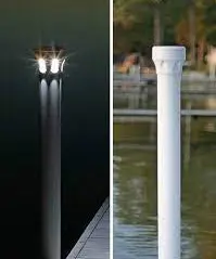 A pole with two lights on top of it.